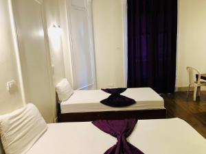 Llit o llits en una habitació de Mesho Cairo Hostel