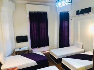 Llit o llits en una habitació de Mesho Cairo Hostel
