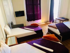 Llit o llits en una habitació de Mesho Cairo Hostel