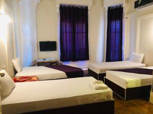 Llit o llits en una habitació de Mesho Cairo Hostel