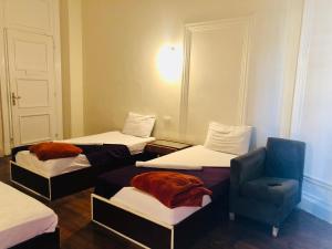 Llit o llits en una habitació de Mesho Cairo Hostel