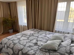 Postel nebo postele na pokoji v ubytování EasyRoom