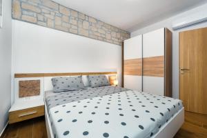 Postel nebo postele na pokoji v ubytování Villa Bajadera