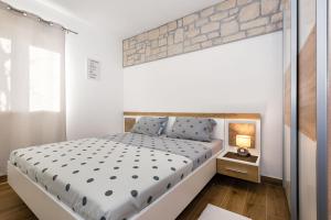 Postel nebo postele na pokoji v ubytování Villa Bajadera + 37 fotografií