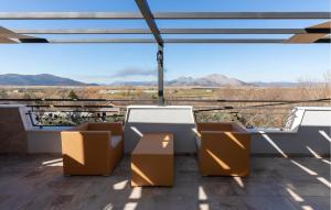 a room with boxes on a balcony with a view at 3 Bedroom Awesome Home In Mliniste in Mlinište