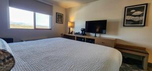 TV a/nebo společenská místnost v ubytování Rayland Hotel + 16 fotografií