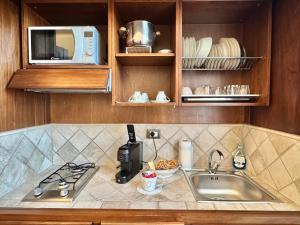 Η κουζίνα ή μικρή κουζίνα στο Appartamento Casa di Danilo Due passi dal mare