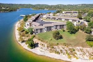 an aerial view of a building on an island in the water at Lakeview Getaway in Kimberling City