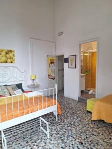 Posteľ alebo postele v izbe v ubytovaní B&B Perla