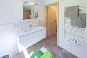 Kúpeľňa v ubytovaní Appartement Premsteingut + 18 fotografií
