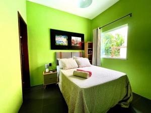 Postel nebo postele na pokoji v ubytování Casa da Farofa + 36 fotografií