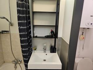 a small bathroom with a sink and a toilet at Wali's Nature Bliss Dinant Givet in Waulsort +22 photos