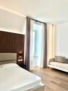 Postel nebo postele na pokoji v ubytování Bianca Guesthouse