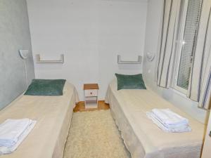 Postel nebo postele na pokoji v ubytování Holiday Home Aquahovi b6 by Interhome