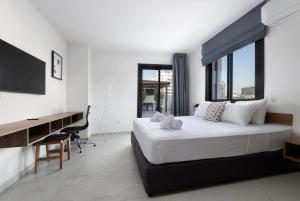 Postel nebo postele na pokoji v ubytování Urban Condo 33 - 2 Bdr