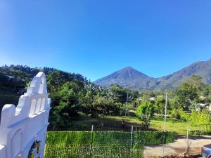 a view of the mountains from a house at Valle de Toliman in San Lucas Tolimán