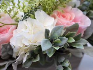 a bouquet of flowers in a vase on a table at Apartment Harbour Nights 7E by Interhome in Lossiemouth