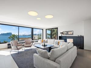 a living room with a couch and a table at Villa Cabo de Gata by Interhome in Moraira