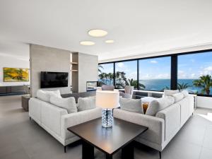 a living room with a couch and a table at Villa Cabo de Gata by Interhome in Moraira