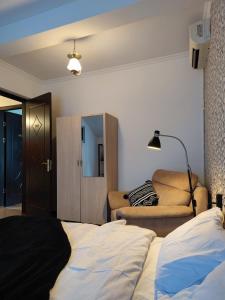 Ένα ή περισσότερα κρεβάτια σε δωμάτιο στο Palm Guesthouse