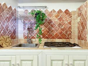 Η κουζίνα ή μικρή κουζίνα στο Holiday Home Due Mari by Interhome +33 φωτογραφίες