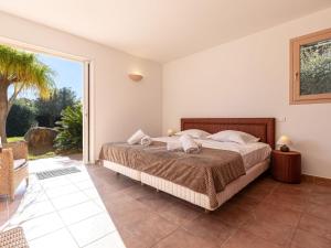 Posteľ alebo postele v izbe v ubytovaní Villa Villa Capicciola by Interhome