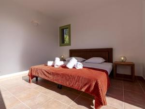 Posteľ alebo postele v izbe v ubytovaní Villa Villa Capicciola by Interhome