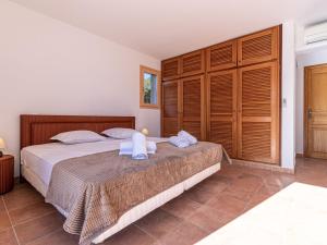 Posteľ alebo postele v izbe v ubytovaní Villa Villa Capicciola by Interhome
