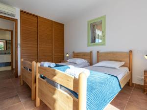 Posteľ alebo postele v izbe v ubytovaní Villa Villa Capicciola by Interhome