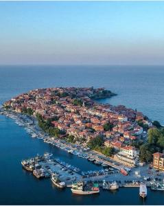 an aerial view of a harbor with boats in the water at Sozopol Sunrise A in Sozopol