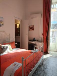 Posteľ alebo postele v izbe v ubytovaní B&B Perla