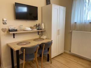 Kuchyňa alebo kuchynka v ubytovaní BellaVista 2 Apartman