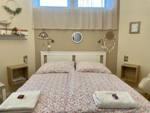Posteľ alebo postele v izbe v ubytovaní BellaVista 2 Apartman