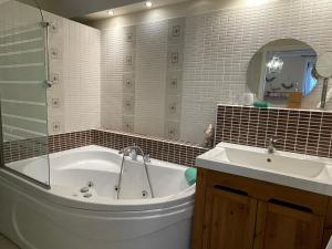Kúpeľňa v ubytovaní BellaVista 2 Apartman