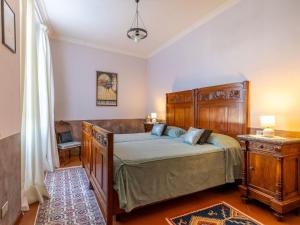 Ένα ή περισσότερα κρεβάτια σε δωμάτιο στο Apartment Antica Casa Balsari by Interhome