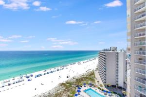an aerial view of a beach and a building at Dunes of Panama 1506 in Panama City Beach