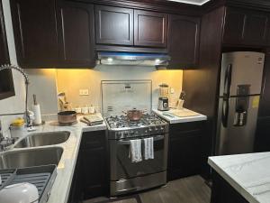 Kuchyň nebo kuchyňský kout v ubytování Millers Townhouse