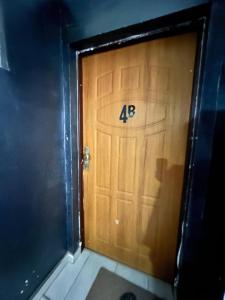 a wooden door with the number on it at Brilliant Souterrain Apt. - Prater Amuesement Park in Vienna +2 photos