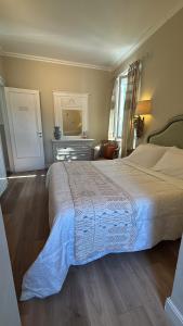 Voodi või voodid majutusasutuse Gian Paul Hotel toas