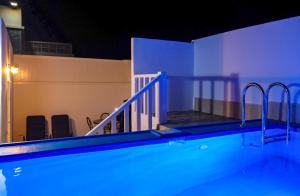 a swimming pool at night with blue lights at Dakhla oasis in Dakhla