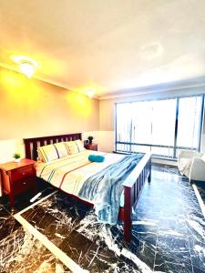 Ένα ή περισσότερα κρεβάτια σε δωμάτιο στο Affordable Long-Term Stay ENS Master Bedroom in Perth Fremantle University Hospital