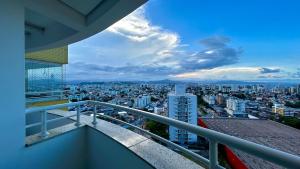a view of a city from the balcony of a building at Condomínio próximo a ponte Hercílio Luz in Florianópolis