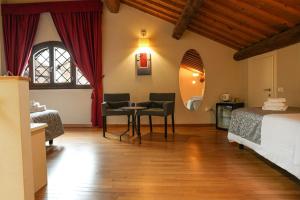 Postel nebo postele na pokoji v ubytování Honey Rooms Ferrara