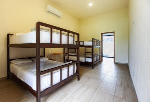 Ένα ή περισσότερα κρεβάτια σε δωμάτιο στο Villa Tulipan las estacas morelos +28 φωτογραφίες