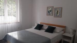 Posteľ alebo postele v izbe v ubytovaní Apartment Andrej