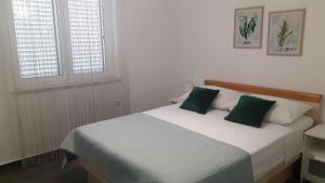 Posteľ alebo postele v izbe v ubytovaní Apartment Andrej