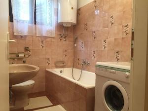 Kúpeľňa v ubytovaní Apartment Kolt + 37 fotografií
