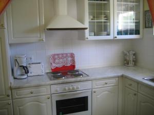 Kuchyň nebo kuchyňský kout v ubytování Apartment Božena
