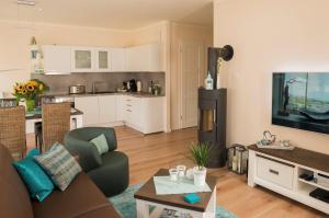 Η κουζίνα ή μικρή κουζίνα στο Ostsee - Appartement Nr 68 "Utspann" im Strand Resort