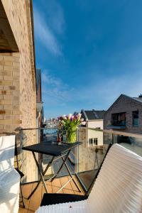 Μπαλκόνι ή βεράντα στο Ostsee - Appartement Nr 90 "Seestern" mit Strandkorb im Strand Resort +16 φωτογραφίες